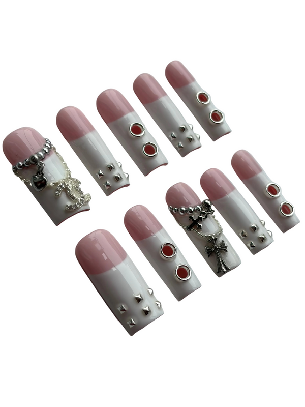 STUDDED DOLL